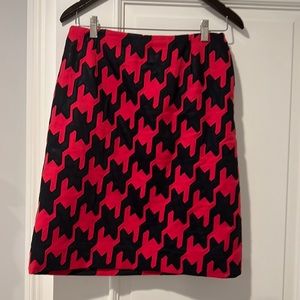 red and black skirt alone